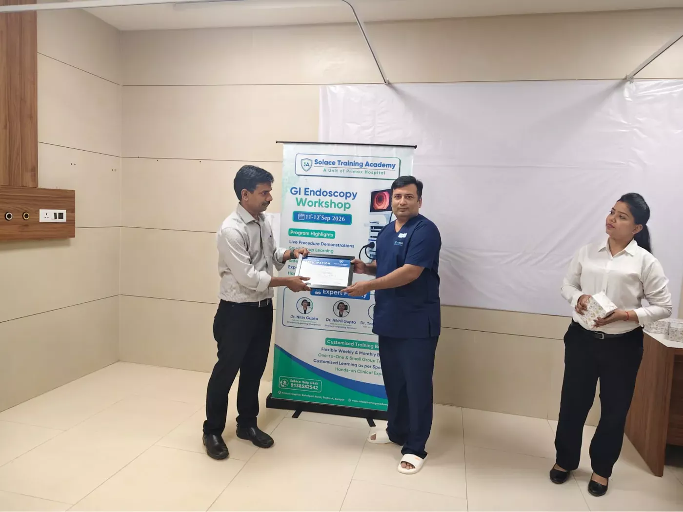 Certificate presentation during the GI Endoscopy Workshop, September 2026