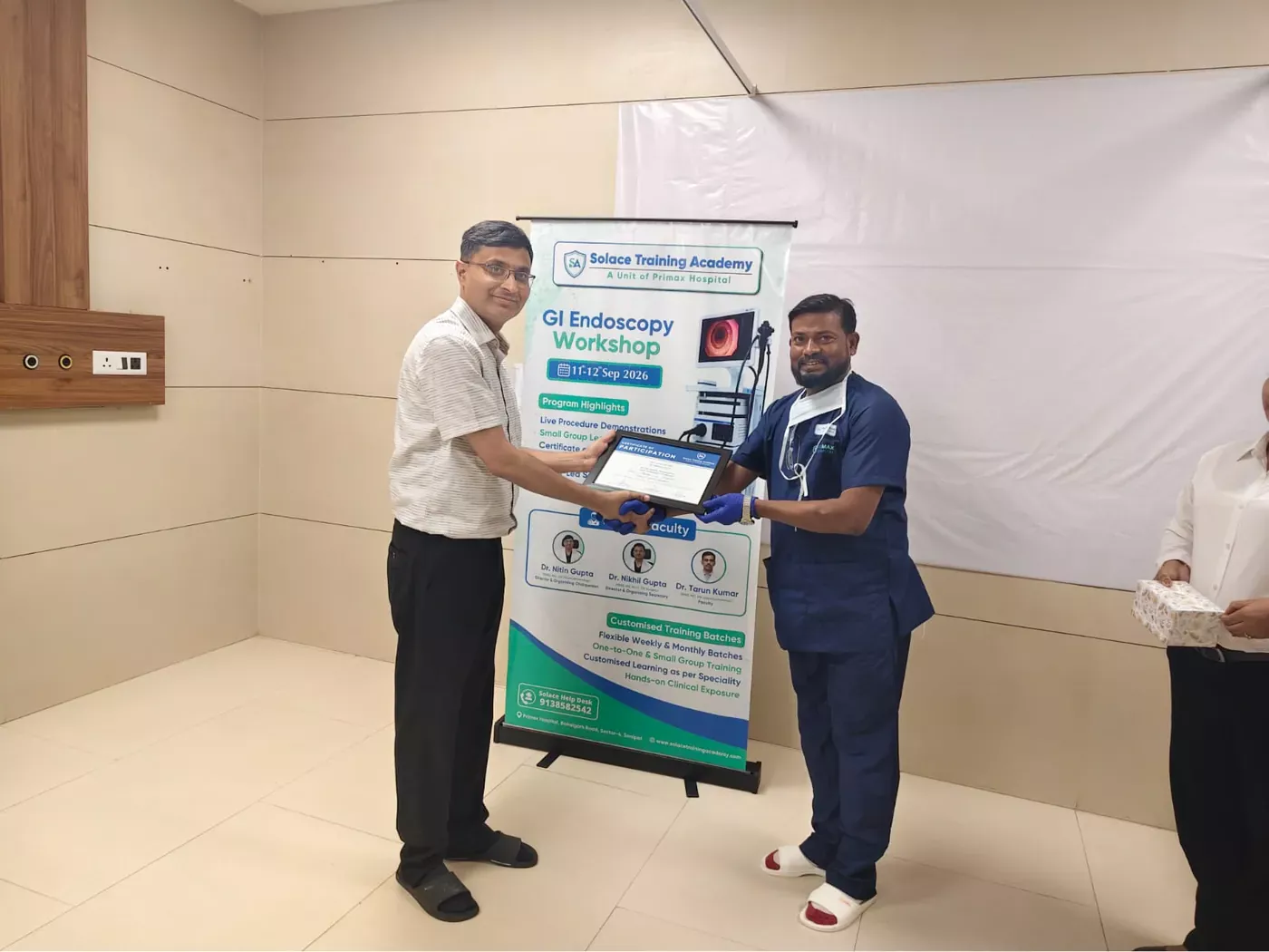 Certificate presentation during the GI Endoscopy Workshop, September 2026